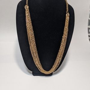 Gold tone multi-strand chain necklace